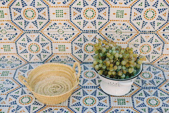Grapes and wicker basket.