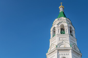 white bell tower of the Russian Orthodox Churchagainst bright blue sky, Yegoryevsk, Alexander...