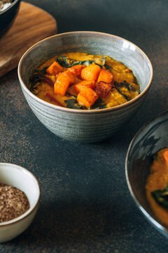 Red lentil soup with swiss chard and pumpkin