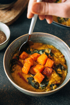 Red lentil soup with swiss chard and pumpkin