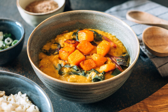 Red lentil soup with swiss chard and pumpkin