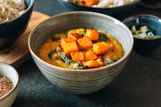 Red lentil soup with swiss chard and pumpkin