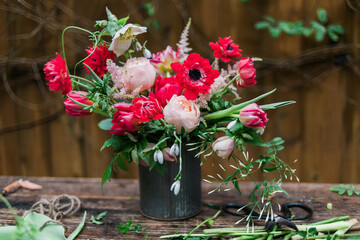 Flower arrangement on a wooden table.