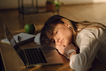 Young woman tired On Her Working Place