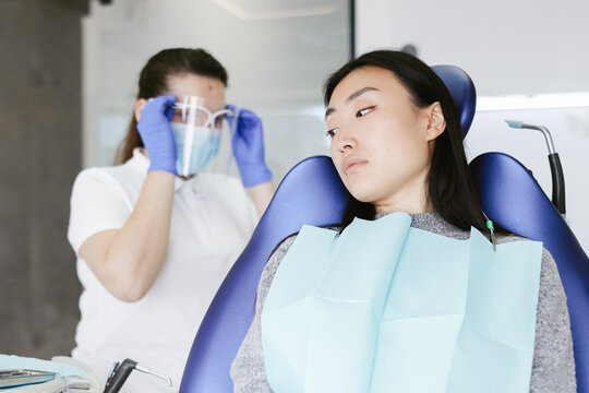 Woman waiting for planned appointment in orthodontist 