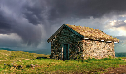 old stone house in the mountains