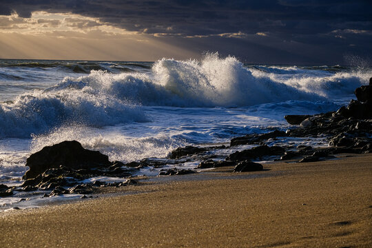 Storm driven waves hitting rocks