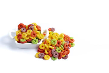 multicolored ring shaped cereals on white background
