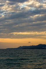 Fototapeta na wymiar Amazing sea sunset, the sun, waves, clouds