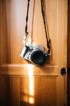 vintage camera hanging on the door
