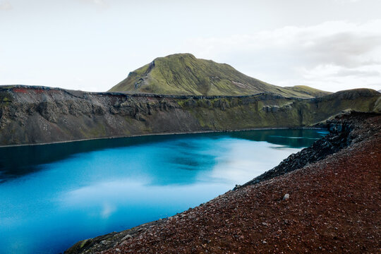 Drone / Aerial view of the stunning blue crater lakes of Bl&aacute;hlyur and Lj&oacute;tipollur in the Icelandic Highlands.