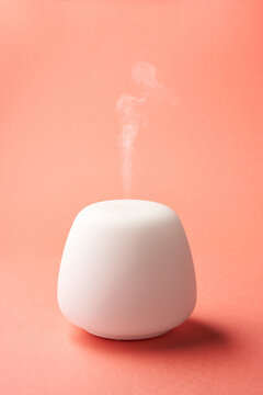Modern humidifier spraying essential oil