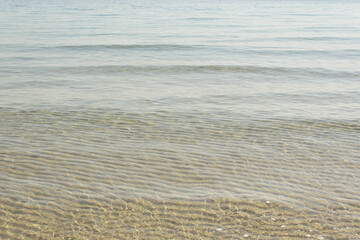 Abstract light colors calm sea water texture surface background summer travel relax nature concept