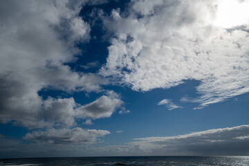 Fototapeta premium Blue sky and clouds at Depoe Bay on the Oregon coast