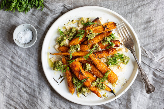 Roast Carrots With White Bean Puree And Pesto