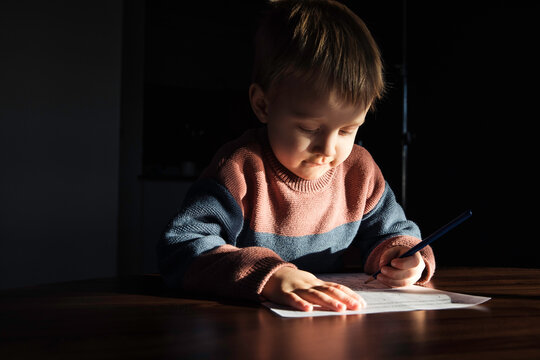 Little boy doing homework