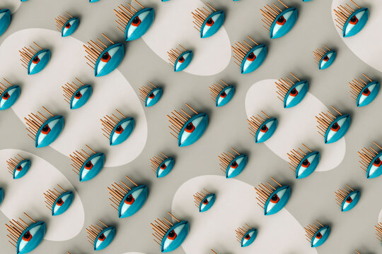 top down view of Abstract eyes on grey background - 3D image