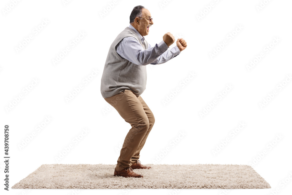 Poster full length profile shot of a happy mature man gesturing with hands