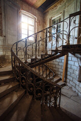 Old vintage spiral staircase at the old abandoned building © Mulderphoto