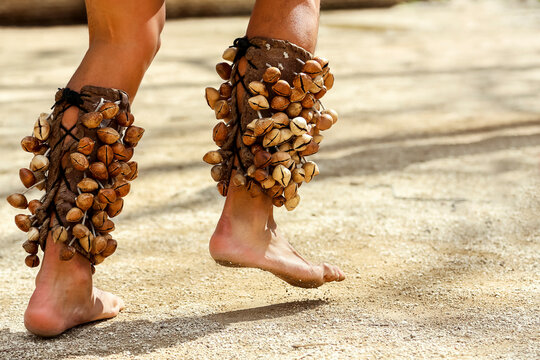 Close Up Feet Of Indigenous Man Dancing In Traditional Costume