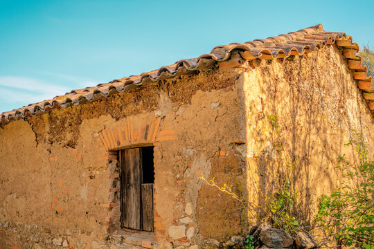 Demolished rural house at field