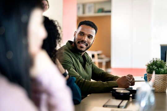 Multiethnic Coworkers Working Together in Office