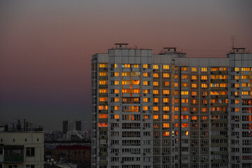 Burning windows at sunset