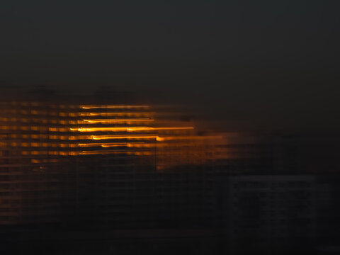 Burning windows at sunset