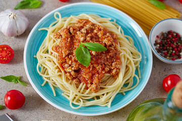 spaghetti bolognese on a granite surface