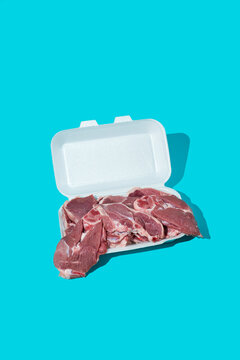 raw lamb meat in a foam box