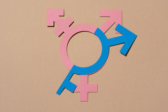 transgender symbols on a brown backgroynd