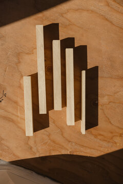 pieces of wood in sunlight and shadow