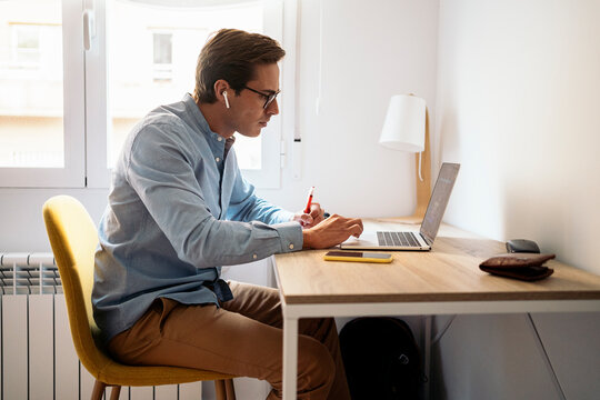 Man Teleworking from Home