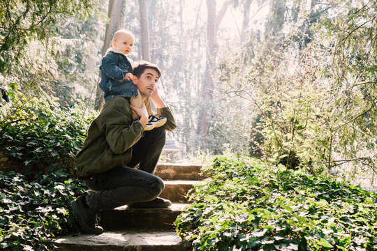 Father and baby having fun in nature