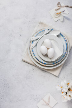 White spring flowers elegant table setting