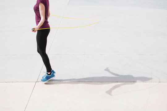 Woman practicing jump rope