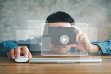man wearing VR glasses and using mouse and keyboard for streaming online, watching video on internet, live concert, show or tutorial