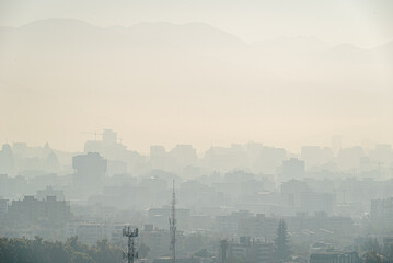 Fototapeta premium View of Santiago Chile with pollution and smog. Contamination problem.
