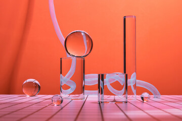 crystal ball and prism on the background of a candle on a table