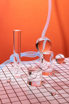 Light, shadow, reflection and color effects in glass objects located in a table