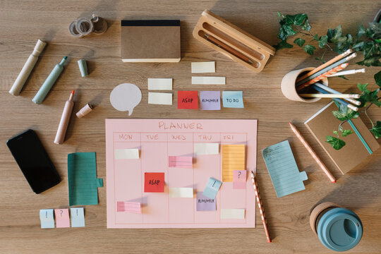 Layout Of Planner And Office Supplies From Above