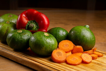 different vegetables on wooden board
