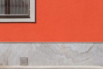 red wall and window on minimal street view