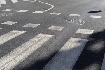 detail of bike path and pedestrian stripes
