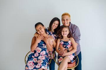 Happy lesbian couple and daughters