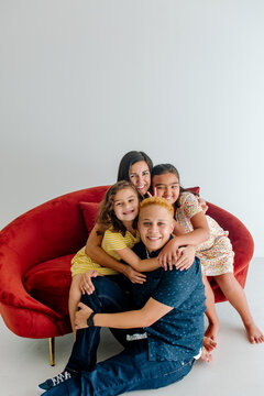 Daughters hugging bonus mom