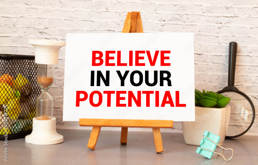 Wall mural believe in your potential. motivational quote. success achievement concept