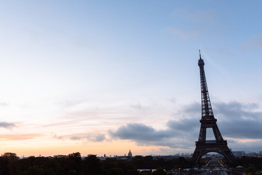 A stunning view of the Eiffel Tower in Paris, France at sunrse