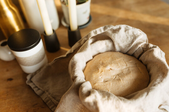 Uncooked sourdough bread dough sitting in bowl 