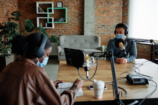 Coworkers in Podcasting studio during pandemic 